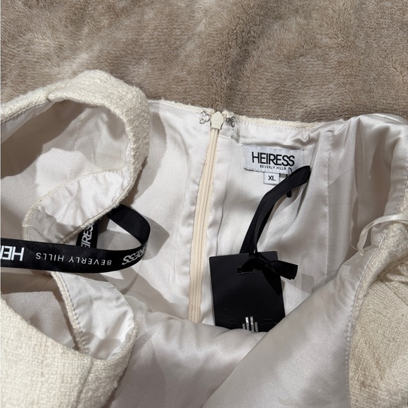 Chic Cream Mini Dress with Floral Accent - Picture 5 of 5